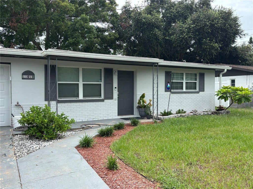 Photo of 11010 Hassle Avenue, Port Richey, FL 34668 (MLS # W7890233)