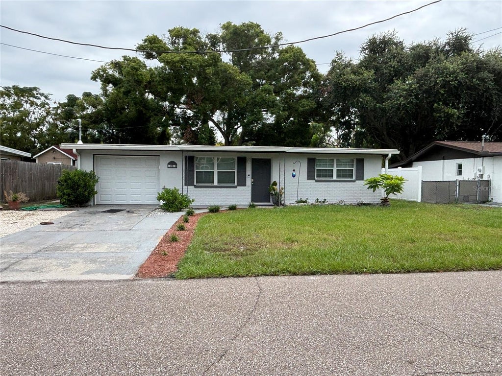 Photo of 11010 Hassle Avenue, Port Richey, FL 34668 (MLS # W7890233)