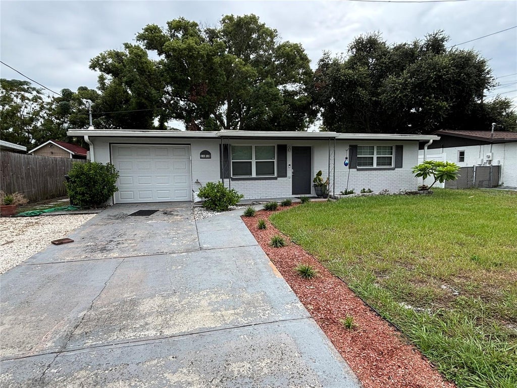 Photo of 11010 Hassle Avenue, Port Richey, FL 34668 (MLS # W7890233)