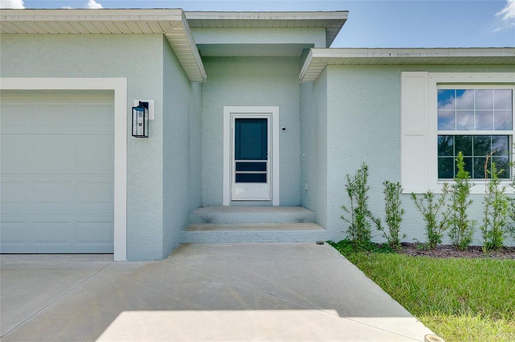 Photo of 13291 Marathon Boulevard, Port Charlotte, FL 33981 (MLS # N6140702)