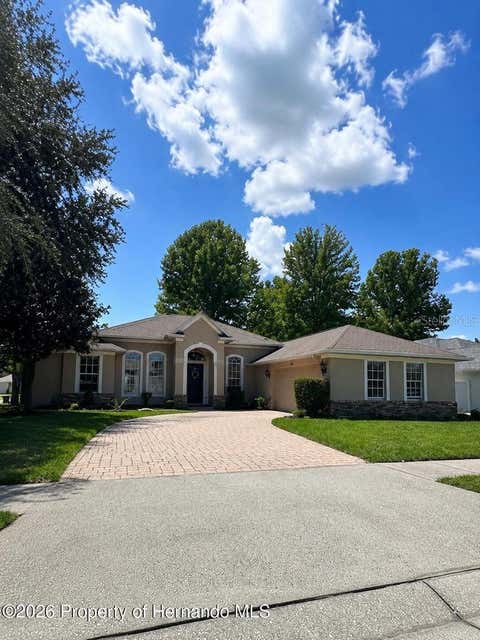 Photo of 5598 Thorngrove Way, Spring Hill, FL 34609 (MLS # W7888895)