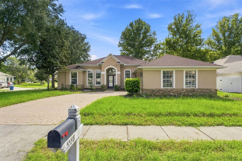 Photo of 5598 Thorngrove Way, Spring Hill, FL 34609 (MLS # W7888895)