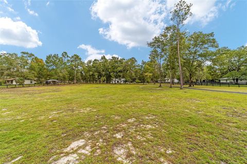 Tiny photo for 985 NW 73rd Terrace, Ocala, FL 34482 (MLS # OM697469)