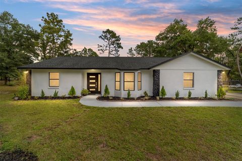 Photo of 985 NW 73rd Terrace, Ocala, FL 34482 (MLS # OM697469)