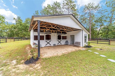 Tiny photo for 985 NW 73rd Terrace, Ocala, FL 34482 (MLS # OM697469)
