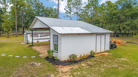 Tiny photo for 985 NW 73rd Terrace, Ocala, FL 34482 (MLS # OM697469)