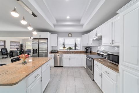 Tiny photo for 985 NW 73rd Terrace, Ocala, FL 34482 (MLS # OM697469)