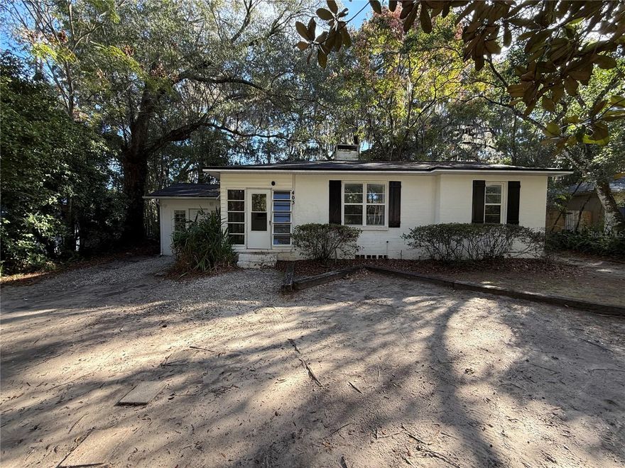 Charming and updated 3-bed, 2-bath ranch-style home just minutes from the University of Florida. Featuring original hardwood floors, a cozy fireplace, and a large, fenced backyard perfect for entertaining or relaxing under the trees. Major updates include a new roof and water heater (2022), and a newer A/C system. Whether you're looking for a primary residence or a smart investment near UF, this move-in ready home on a 0.24-acre lot offers unbeatable value and location.