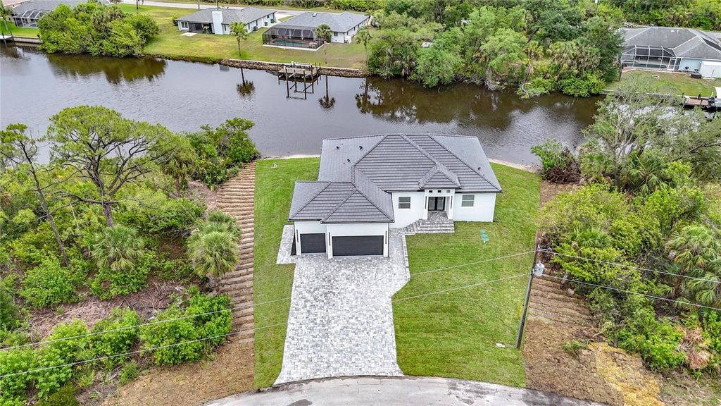 Photo of 576 Mcdill Drive, Port Charlotte, FL 33953 (MLS # C7511446)