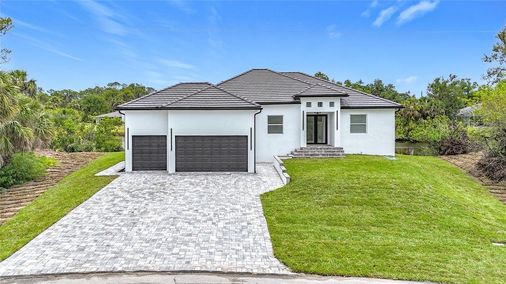Photo of 576 Mcdill Drive, Port Charlotte, FL 33953 (MLS # C7511446)