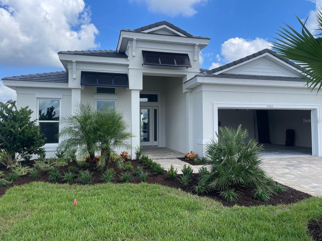 Photo of 1561 Lake Bank Lane, Deland, FL 32724 (MLS # FC321069)