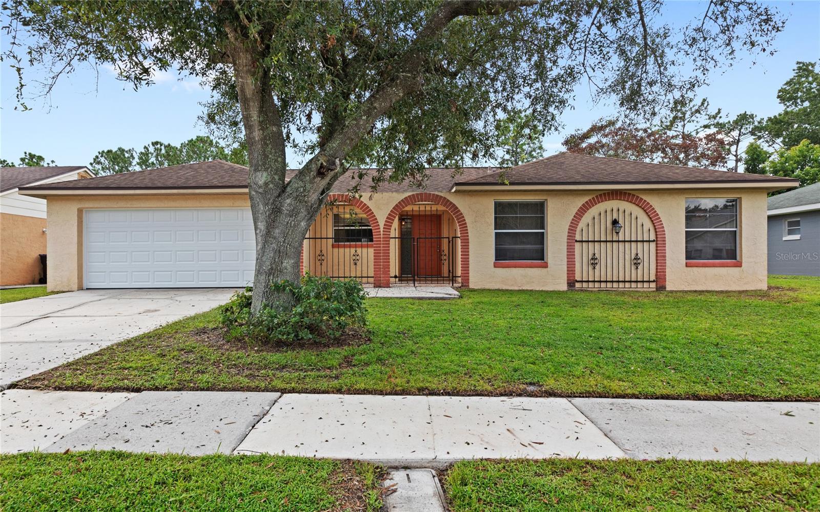 Nestled in the well-established Meadow Woods community with NO HOA, this single-owner home is ready for it's next chapter. Stepping inside, the home boasts a split floor plan with 4 bedrooms, 3 bathrooms, a formal living room, family room, and formal dining room, providing ample space for living and entertaining. Conveniently, three of the four bedrooms have EN-SUITE bathroom access, making this layout suitable for all living arrangements. The private screened-in POOL, and the privacy of having NO REAR NEIGHBORS, allows you to enjoy indoor-outdoor living year round! The home features an abundance of upgrades and renovations, including a ROOF replacement (2021), HVAC replacement (2025), Dual ELECTRICAL PANEL replacement (2025), new WATER HEATER (2025), new CARPETING in all bedrooms (2025), fresh interior PAINT & exterior touch-up PAINT (2025), full PEX RE-PLUMB (2023), new GARAGE door (2024), new POOL PUMP (2025), and more, serving as a blank slate and strong foundation for any buyer to add their personal touch! With a commute time of less than 10 minutes to Orlando International Airport, 20 minutes to Downtown Orlando, 20 minutes to Walt Disney World, 20 minutes to Universal Studios, and 5 minutes to your nearest Publix Shopping Center, this home keeps you in the heart of everything that Orlando has to offer. Within 5-10 minutes from the home, you'll also find the Meadow Woods Sunrail Train Station, Meadow Woods Elementary, South Creek Middle School, Cypress Creek High School, and Orlando City's Soccer School. Contact us to schedule your private viewing today!