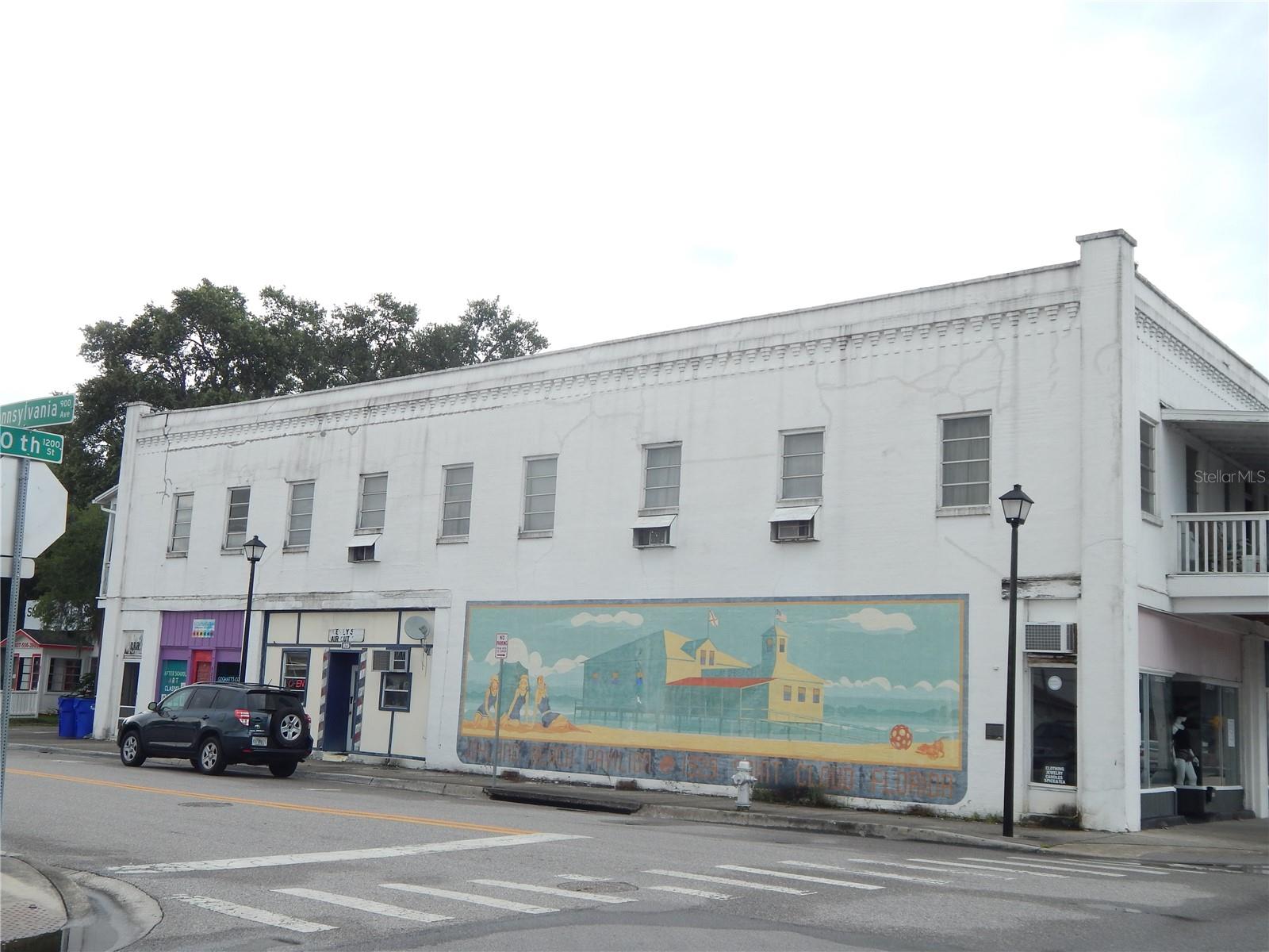 Located in Downtown St. Cloud, upstairs studio apartment. Kitchen with refrigerator, range, and eat-in space. Coin washer and dryer in common area on porch.