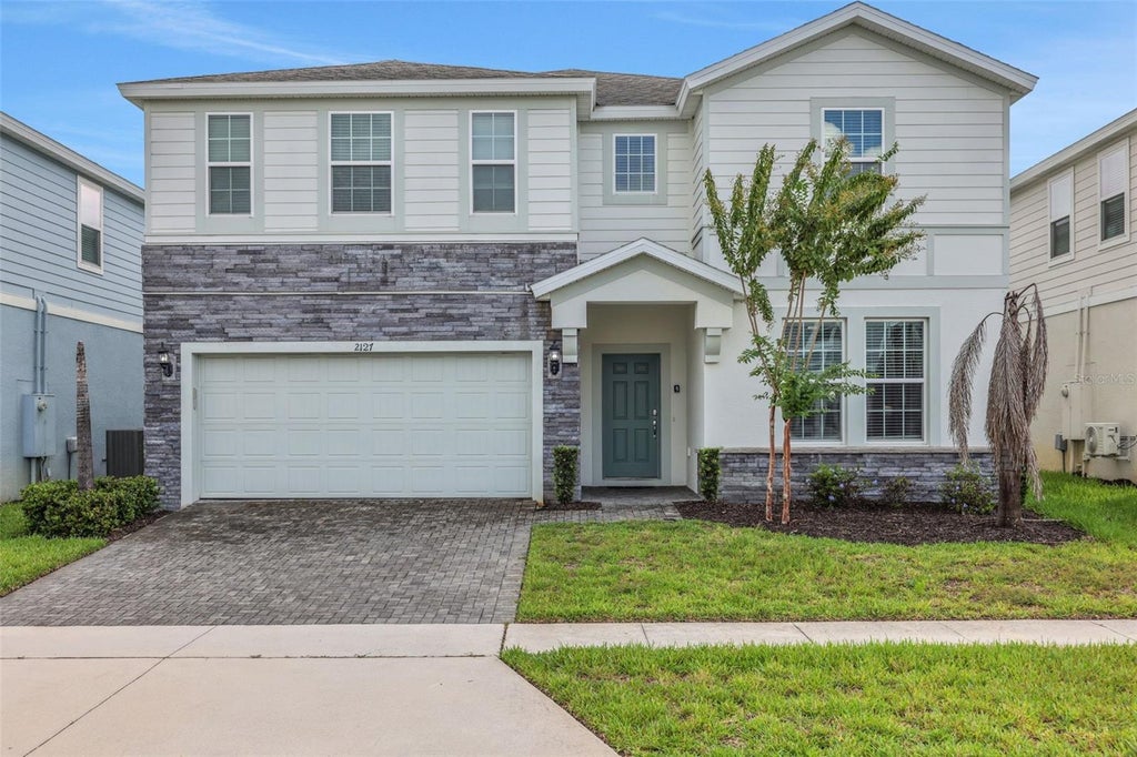 Photo of 2127 Lelani Circle, Davenport, FL 33897 (MLS # O6436965)