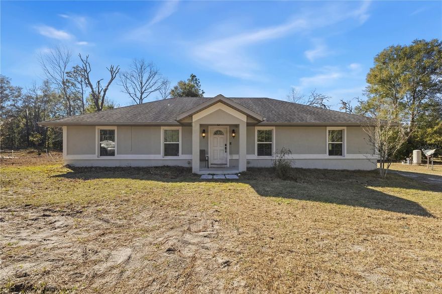 Beautifully maintained 3-bedroom, 2-bath home on 5 acres, built in 2019 and located JUST OVER THE GILCHRIST COUNTY LINE, offering the highly desirable benefit of lower property taxes! Enjoy the financial advantage of this location while still being close to nearby conveniences.

Inside, the home features an updated, modern look with beautiful finishes throughout. The spacious kitchen is a standout, complete with granite countertops, a farmhouse sink, and stylish cabinetry, ideal for both everyday living and entertaining. The open layout creates a bright, welcoming feel that’s both functional and comfortable.

Outside, the property truly shines with gorgeous, open land and abundant wildlife, making it perfect for a homestead or peaceful country retreat. An RV hookup on the property adds flexibility and value—ideal for guests, travel enthusiasts, or extra utility for rural living.

This property offers the best of all worlds: newer construction, move-in-ready style, usable acreage, RV accommodations, and lower county taxes. A rare opportunity to enjoy space, privacy, and smart ownership just across the county line.