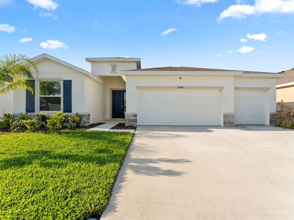 Photo of 33700 Hamilton Hill Lane, Wesley Chapel, FL 33545 (MLS # TB8492561)
