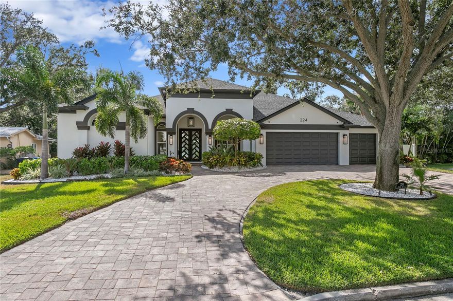 An ideal location on Snell Isle, 224 Toledo Way NE is a 2015 custom home that went through over $750K in renovations in 2023. At a great elevation 9.4 ft with policy of $826/ year.  Never flooding or water pooling on street and surrounded by other beautiful new construction homes. Just a block to Brightwaters Blvd makes it THE IDEAL location and house for a buyer that wants top of the line everything.  An open and functional layout with a pantry, mud room and 5th bedroom with closet (that is currently an office.) Gorgeous finishes with all new flooring throughout (Coretec plus luxury vinyl in Ellidy Oak) an incredible custom kitchen rebuilt completely with all new cabinets, fixtures, lighting, appliances, Cambria 2.5" Quartz countertops with waterfall and an incredible custom built and massive wall feature to highlight the clean lines and natural textured style accented by gorgeous wood beams in the living room. It's a WOW. A new whole house generator and turf and fencing for the side and backyard. New epoxy finished garage floor. New security system and cameras. The incredible master bathroom with bidet water closet and walk-in closet were completely rebuilt and create THE BEST primary suite you have seen on Snell! The one story layout feels great and opens to the screened patio/ pool area and outdoor kitchen making the outside another incredible room to enjoy year round. 2025 roof, new AC's, all new copper pipes, water filtration and water softener, new painting inside and out, custom landscaping and exterior lighting. Nothing has been untouched and there is nothing left to do.