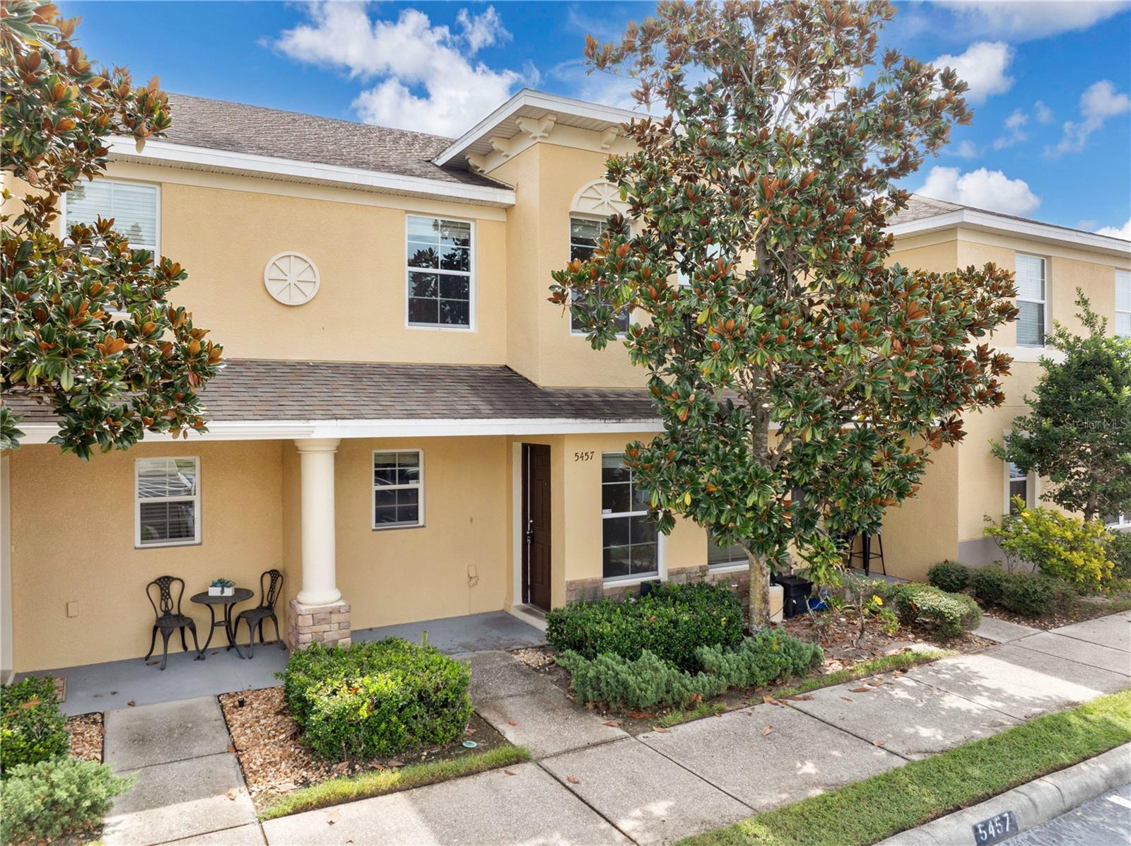 Step into this beautifully refreshed 2 bedroom, 2.5 bath townhome in the desirable gated community of Cobblestone Landing.
The kitchen offers a convenient pass-through to the breakfast bar and dining area, plus a brand-new range for the cook in the family. Upstairs, you’ll find two generously sized bedrooms along with a versatile bonus room—perfect as a third bedroom, home office, den, or fitness space. Enjoy peaceful evenings on your screened porch or take advantage of community amenities, including a sparkling pool and 24-hour security. The home also features an indoor utility area with washer and dryer for added convenience. Ideally located, this townhome is just a short walk to shopping and only minutes from I-4, making commutes a breeze.