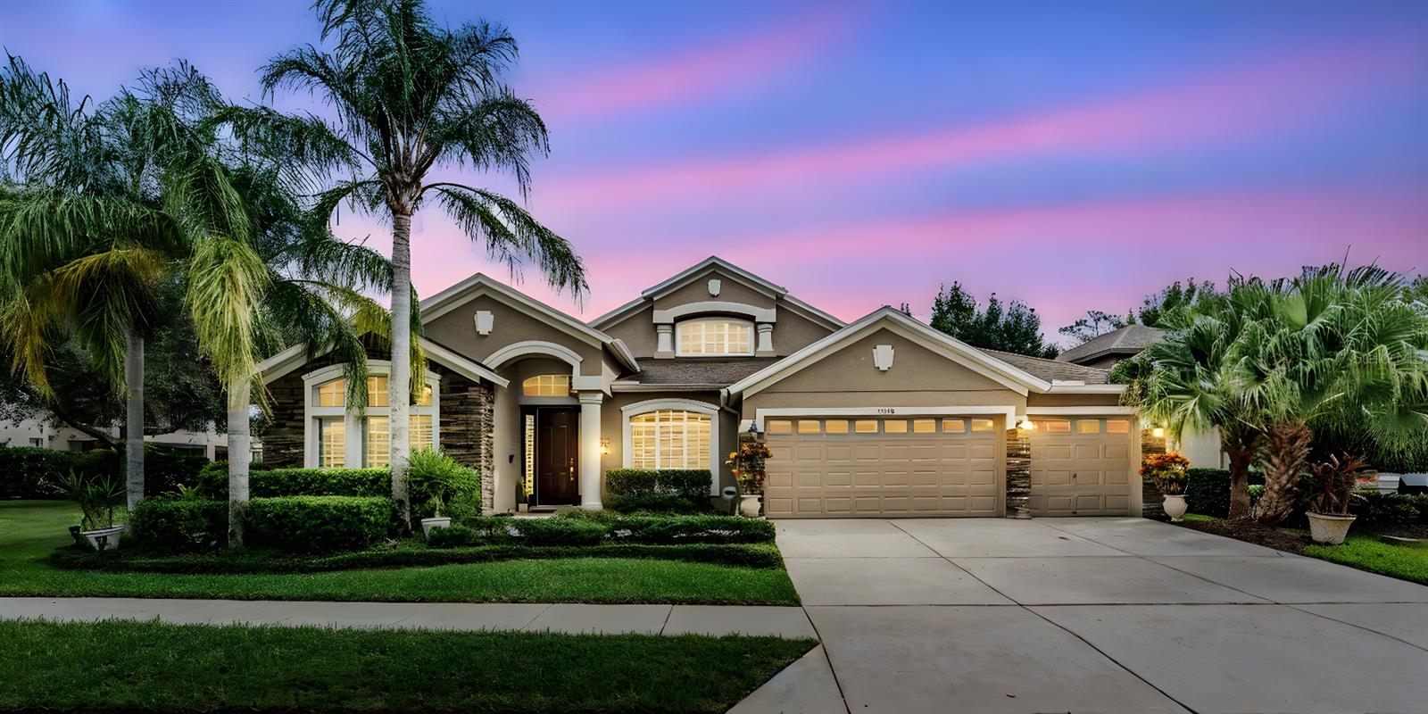 Experience the Best of Florida Living! Welcome to Grey Hawk at Lake Polo, a premier gated community where elegance meets the relaxed Florida lifestyle. This stunning 5-bedroom, 3-bath residence with an office and upstairs loft offers the perfect balance of sophistication, comfort, and space for both everyday living and entertaining. Step inside to an open-concept design that flows effortlessly, anchored by a gourmet kitchen featuring a double oven with convection, an induction stovetop, and a custom walk-in pantry. A separate bar with a wine cooler sets the stage for evenings filled with laughter, entertaining, and memorable gatherings…Not to mention an amazing view of your back yard oasis! Step outside and immerse yourself with the expansive pool deck, finished with travertine pavers, showcases a sparkling heated saltwater pool and spa with waterfalls and custom LED lighting. Whether enjoying a refreshing swim under the afternoon sun or cozying up beside the dramatic fire wall on a cool evening, this outdoor space embodies the very essence of the Florida lifestyle. The backyard is still substantial for outdoor living and a view of the neighbor's pond and horses on their 10 Acre equestrian property. The master suite is a private retreat, complete with a sitting area and newly remodeled spa-like bath. Modern grey wood tile, a soaking tub, and a separate walk-in shower create the perfect place to unwind after a sun-soaked Florida day. This split floorplan allows an abundance of privacy with the four additional bedrooms on the opposite side of the home. There is also an office with glass French doors at the front of the home. Upstairs is also a large loft that could be made into a game room or an additional bedroom. Even the 3-car garage is thoughtfully designed with a stylish wood accent wall and Nema 14-50 plug for EV charging—blending function with modern convenience. The Seller replaced both AC units in 2025, The Roof 2010 and the Water Heater 2010. Every detail reflects pride of ownership, from the grand spaces to the carefully curated finishes. This is more than a home—it’s a lifestyle. Located in A-Rated Mitchell High School District and close to the Suncoast Parkway close to Tampa International Airport, Shops, Restaurants and the Beaches. Don’t miss your opportunity to experience it for yourself. Schedule your private tour today!