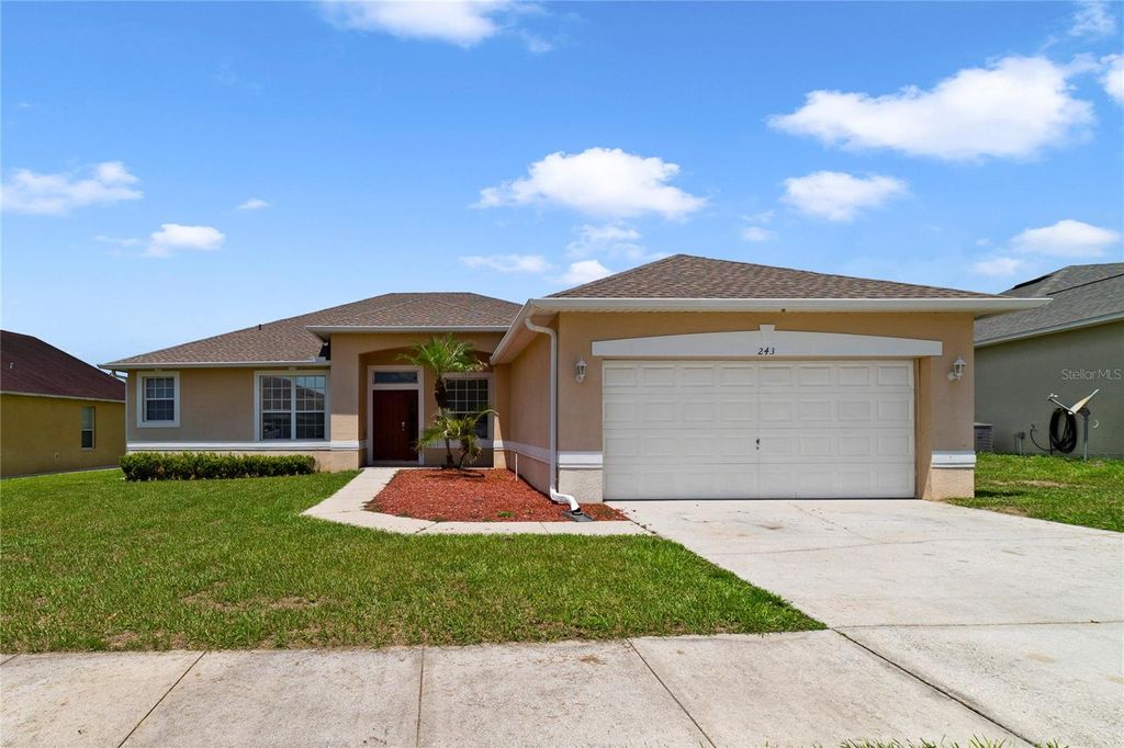 Photo of 243 Wildflower Road, Davenport, FL 33837 (MLS # O6425697)