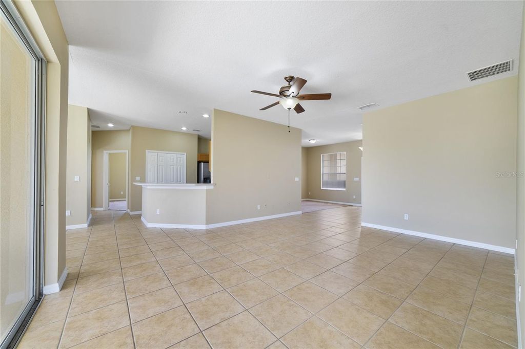 Photo of 243 Wildflower Road, Davenport, FL 33837 (MLS # O6425697)