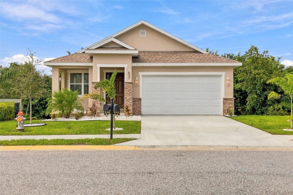 Photo of 537 Pineloch Drive, Haines City, FL 33844 (MLS # TB8518131)