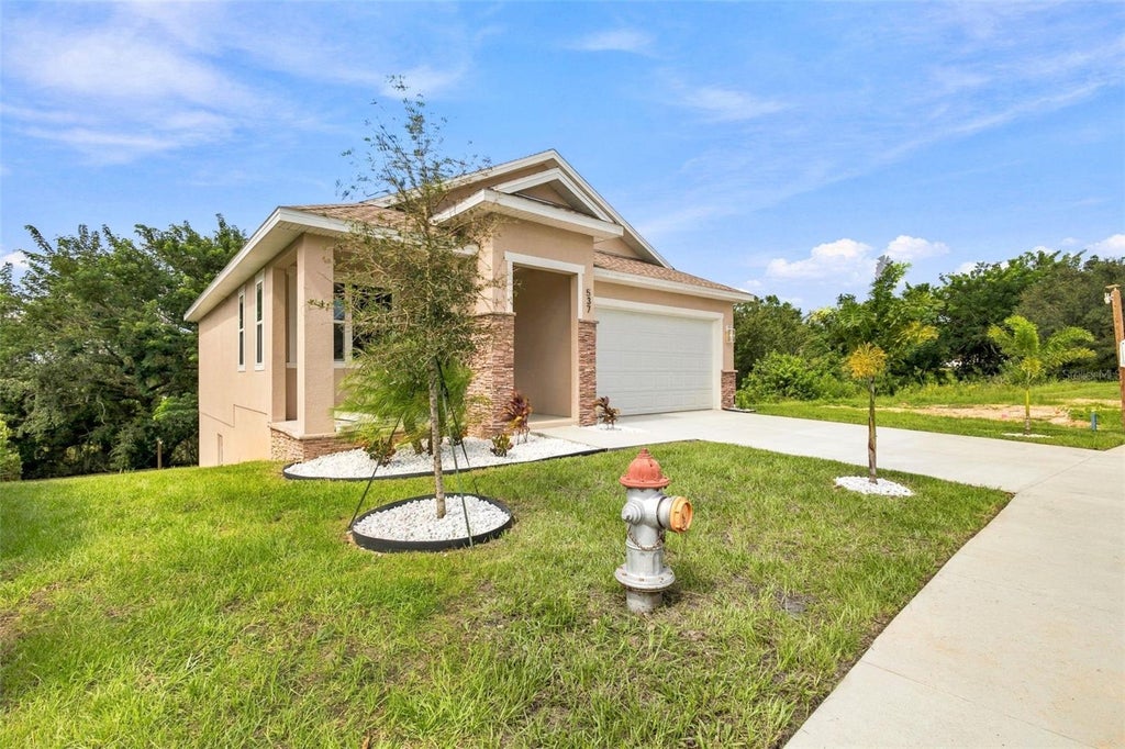 Photo of 537 Pineloch Drive, Haines City, FL 33844 (MLS # TB8518131)
