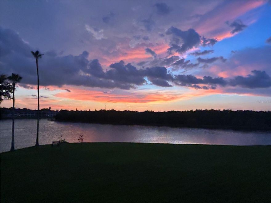 Welcome to a rare opportunity in the highly sought-after gated community of Shores of Long Bayou in beautiful Seminole!
This spacious 3-BED, 2-BATH, 1 CAR GARAGE residence offers 1576 sq ft of thoughtfully designed living space with breathtaking, unobstructed views of Long Bayou!- From the moment you enter, you'll be captivated by the serene waterfront backdrop, abundant natural light and peaceful coastal ambiance that defines this exceptional home. 
The kitchen opens seamlessly into the living and dining areas, perfect for entertaining or simply relaxing while enjoying panoramic bayou vistas and spectacular sunsets! - As an added bonus...you can enjoy those gorgeous views from inside or out on a large, open deck!
The primary suite boasts tranquil water views, generous closet space and a private ensuite bath, creating a true retreat and the split-bedroom floor plan provides two additional, generously sized bedrooms on the opposite side of the home, offering exceptional privacy for both residents and guests.  You'll also have an outside storage closet and private garage with ample storage space or work area so, bring all the toys!  Inside laundry! 
Shores of Long Bayou is a guard-gated, resort-style community surrounded by lush natural preserves and scenic walking trails. Residents enjoy a beautifully appointed clubhouse, heated swimming pools and spa, fitness center, tennis and pickleball courts, and inviting social spaces. 
Nature lovers will appreciate the abundant wildlife, peaceful surroundings and opportunities for kayaking, birdwatching and waterfront relaxation right outside your door.
Ideally located just minutes from pristine Gulf beaches of Madeira Beach, Redington Shores, Indian Shores and Indian Rocks and beyond. 
Also nearby: shopping, dining, medical facilities and several beautiful parks giving this spot a perfect blend of tranquility, convenience and Florida coastal living at its finest.  The "Bigger City" nightlife, entertainment and events are just a short drive away to Downtown St. Petersburg, Tampa and Clearwater! *********  ROOF 2023 /     WATER HEATER     2022  /   HVAC  2022**********

                              Come see the beauty, privacy and lifestyle that make Shores of Long Bayou one of St. Pete's hidden gems!
**This building is a monolithic slab foundation (footings and slab poured as one continuous piece,) enhancing structural stability and long-term durability.