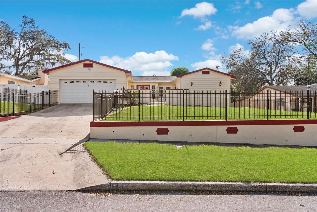 Photo of 6120 Castlewood Lane, Orlando, FL 32808 (MLS # O6369162)