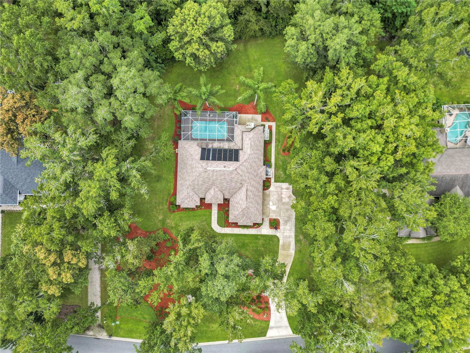 Located in highly sought after Country Club of Ocala with guard gated entry, 18 hole golf course, pickleball courts and amenities galore! This spacious, open floor plan, boasts high ceilings, oversized screened inground pool with covered lanai. Enter into the home with your formal dining room with Wayne’s coating to the right directly in front of you is the first of the living rooms overlooking the gorgeous pool. The primary bedroom is to the far left of the home and features a sitting area. Two walk-in closet with custom features spa like primary bath with tile surround and glass door shower, garden tub, and double vanities. There is the full third bathroom off of the pool with its own entry off of the covered lanai in this area. A fourth bedroom or office as well. Stepping back across the focal point of the home, stepping into oversize kitchen with all new 2025 stainless steel appliances, and bar top for 6 barstools. This area overlooks the breakfast room with view of
the pool and second oversized Living/family room. Two additional bedrooms and second full bath are just off of this area.Inside laundry room with washer and dryer lead to 2 car garage housing Hot Water Heater 2016, 2017 Hvac, and Water Softener/reverse osmosis /water filtration 2016. Roof 2013. Re plumbed whole house 2015, Garbage disposal 2019. Leading outside of three different areas out to the covered lanai and backyard oasis with inground pool with 2025 new pump, which is screened in. Lush landscaping, privacy, and a 3 mile circle steps away for your fitness goals!