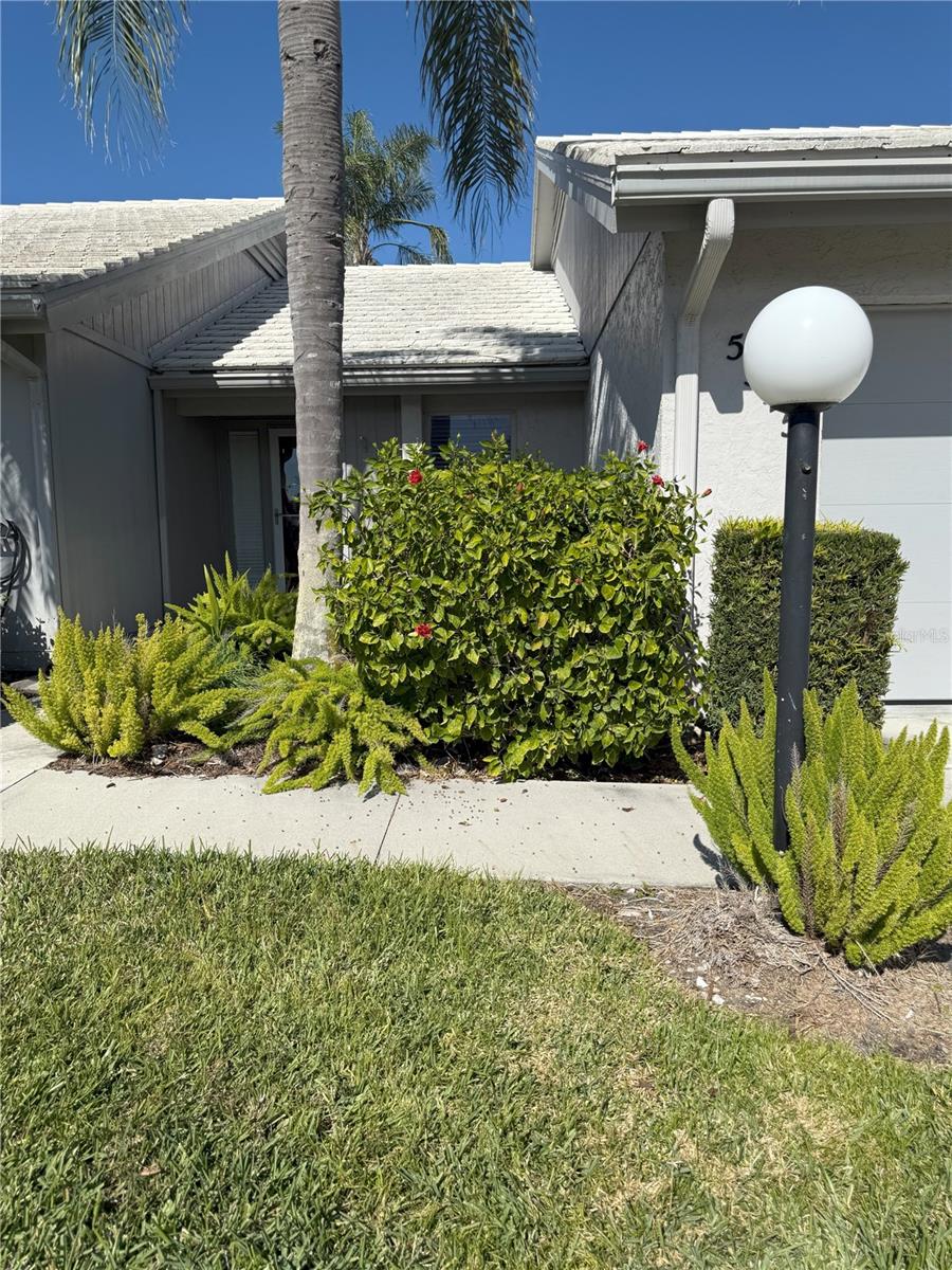 This 1,379 sq ft Villa (duplex ) is move-in ready, offers 2 bedrooms, 2 full bathrooms, a 1 car garage and driveway for additional parking. Crestwood Villas community is situated in Center Gate area of Sarasota, making it a prime location with substantial potential as a primary residence, vacation/seasonal resort or as an addition to your investment/rental portfolio. There are many options available at this property. Buy today, move in tomorrow, lease and invest (1031 exchange), renovate and do a complete makeover and settle into your future in paradise. Create your next dream project here. Upon entering you are drawn to the expansive open concept floor plan, high vaulted ceilings, and flowing floor plan, you'll see the potential the property offers. The living/dining combo attaches to the family room and then goes to the back of the property with sliders that continue out to the covered patio and screened lanai. The kitchen is considered a "galley" design with plenty of cabinets, counter space and storage on both sides. The washer/dryer, utility closet, pantry and access to the garage are convenient to the kitchen entryway. The primary bedroom easily accommodates a king-sized bed and adjoin the en-suite bathroom. Notable location & convenience here. The community pool is perfect to entertain groups, enjoy gatherings with family, friends and enjoy community events. Crestwood Villas is located within close proximity to Sarasota & Manatee County's most desirable cultural events, flourishing economic growth/development and the booming vacation destination of travelers, yet tucked away from the crowds. Convenient to major transportation (I75, University Pkwy, Rt 41), nationally rated golf courses, fishing, boating, UTC Mall, Tesla, IMG Academy, Downtown Sarasota, SRQ/TPA, Medical Centers for Specialized and Senior Care, top rated schools, parks and recreation.