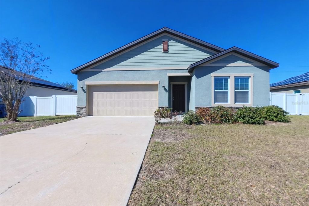 Photo of 326 Hidden Lake Loop, Haines City, FL 33844 (MLS # S5147482)