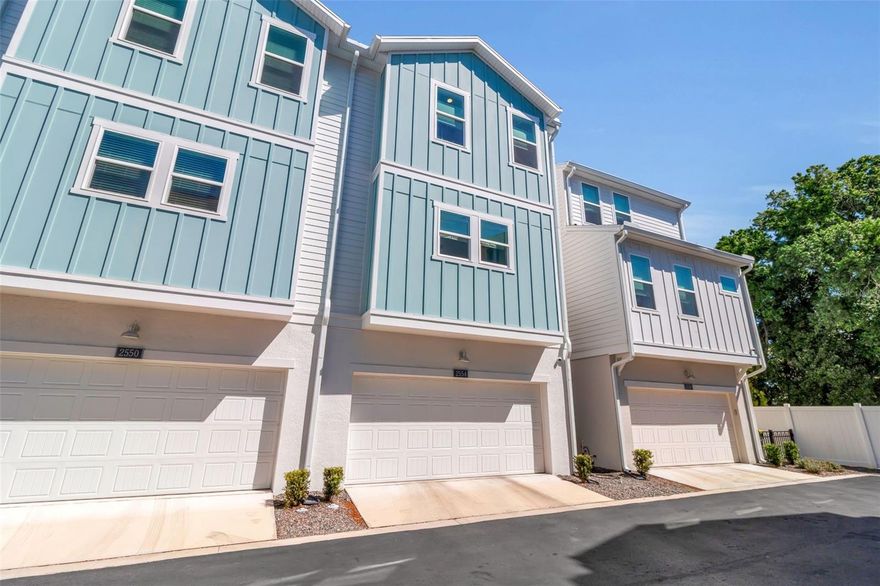 Thoughtfully upgraded and impeccably maintained, this three-level townhome offers a refined take on low-maintenance living in a central Sarasota location, blending modern design with high-end finishes and everyday functionality.

Featuring three bedrooms—each with its own private bath—plus an additional powder room, the layout is designed to provide both privacy and flexibility. An in-home residential elevator, installed at construction, connects all levels, enhancing convenience and long-term livability.

The open-concept main living level serves as the heart of the home, where kitchen, dining, and living spaces flow seamlessly together. The kitchen has been extensively upgraded with Level 5 Calacatta Alta quartz countertops, cabinetry extended to the ceiling, a designer-wrapped island with added storage, and a Café appliance package with Bosch induction cooktop. A full-height tile backsplash, Hansgrohe professional faucet, and custom pantry shelving further elevate both form and function, while Rev-A-Shelf storage systems maximize efficiency.

Upstairs, the primary suite offers a comfortable and well-appointed retreat with a tray ceiling and a custom-designed closet system featuring integrated lighting. The en-suite bath showcases upgraded fixtures and finishes, while all bathrooms throughout the home reflect a cohesive level of quality, including quartz countertops and designer upgrades.

Throughout the home, attention to detail is evident in the Mohawk waterproof luxury vinyl plank flooring, upgraded lighting with dimmers, premium Sherwin-Williams paint, and enhanced hardware selections. Additional highlights include plantation shutters, custom Graber window treatments, hurricane-rated windows, and a full ADT security system with exterior cameras.

The garage is equally well-equipped, featuring a custom storage system, overhead racks, additional lighting, and a secondary refrigerator, offering practical solutions for organization and storage.

Beyond the home, the community offers a heated resort-style pool, private dog park, and professionally maintained landscaping, with association-provided insurance contributing to a simplified ownership experience. Ideally positioned near Payne Park—with tennis courts, walking trails, and green space—and providing direct access to the Legacy Trail, the location also offers walkability to downtown Sarasota’s dining, shopping, and cultural amenities, along with a nearby trolley stop for convenient access to the beaches.

A well-executed combination of thoughtful upgrades, modern convenience, and a prime Sarasota setting—this residence delivers both comfort and quality in a highly accessible location.