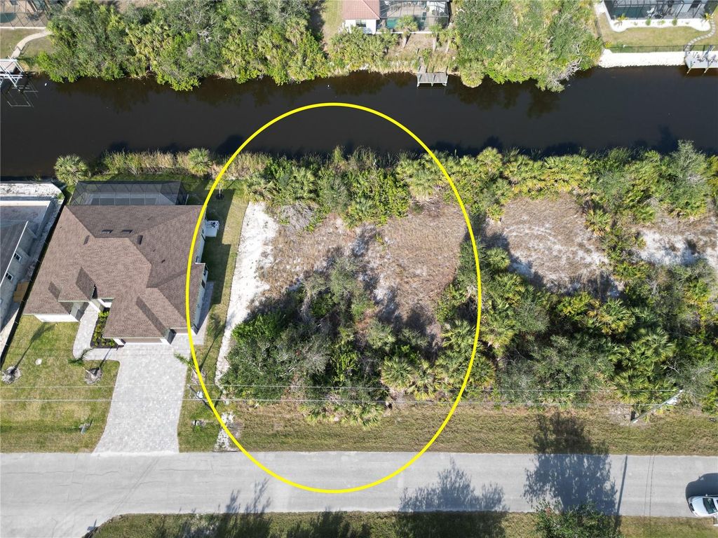 Photo of 13350 Commonwealth Avenue, Port Charlotte, FL 33981 (MLS # D6140657)