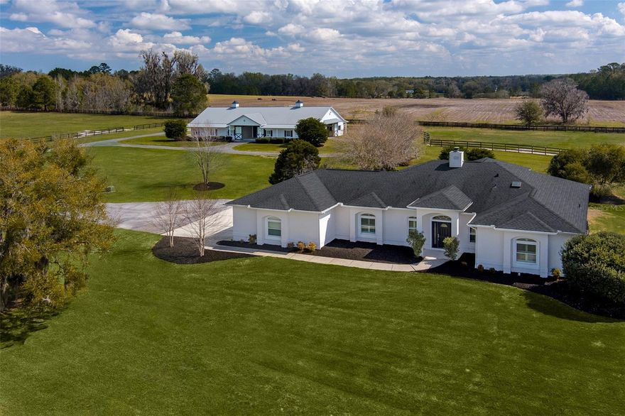 Nestled on 29.88 acres, this exceptional property offers a prime location just 10 minutes from the renowned World Equestrian Center and 5 minutes from Golden Ocala, providing the perfect blend of tranquility and proximity to top equestrian venues. Featuring two well-appointed center-aisle barns with a total of 17 stalls and 10 spacious paddocks, this property is a true haven for horse enthusiasts. The barns are thoughtfully designed with an office, feed rooms, tack rooms, a bathroom, hot water, and wash racks, ensuring both functionality and comfort for horses and caretakers alike. The existing home on the property will require complete renovation or removal, offering a blank canvas for your vision. The property also features a stunning pool, ideal for relaxing and enjoying the gorgeous Florida weather. With its combination of top-tier equestrian facilities and a prime location, this property is the ultimate sanctuary for those seeking both luxury and convenience in an equestrian lifestyle.
