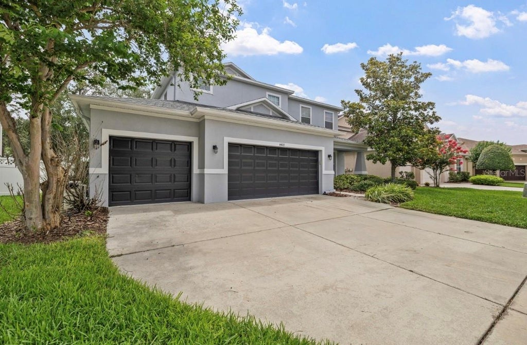 Photo of 4400 Wildstar Circle, Wesley Chapel, FL 33544 (MLS # TB8516383)