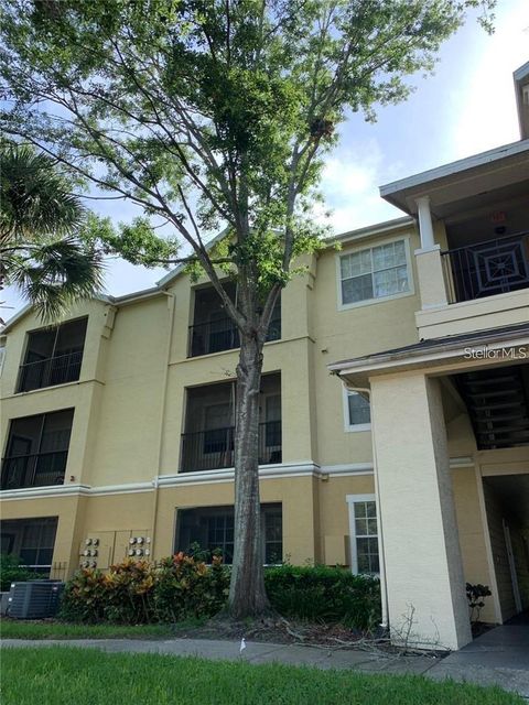 Photo of 2612 Robert Trent Jones Drive #714, Orlando, FL 32835 (MLS # O6378871)