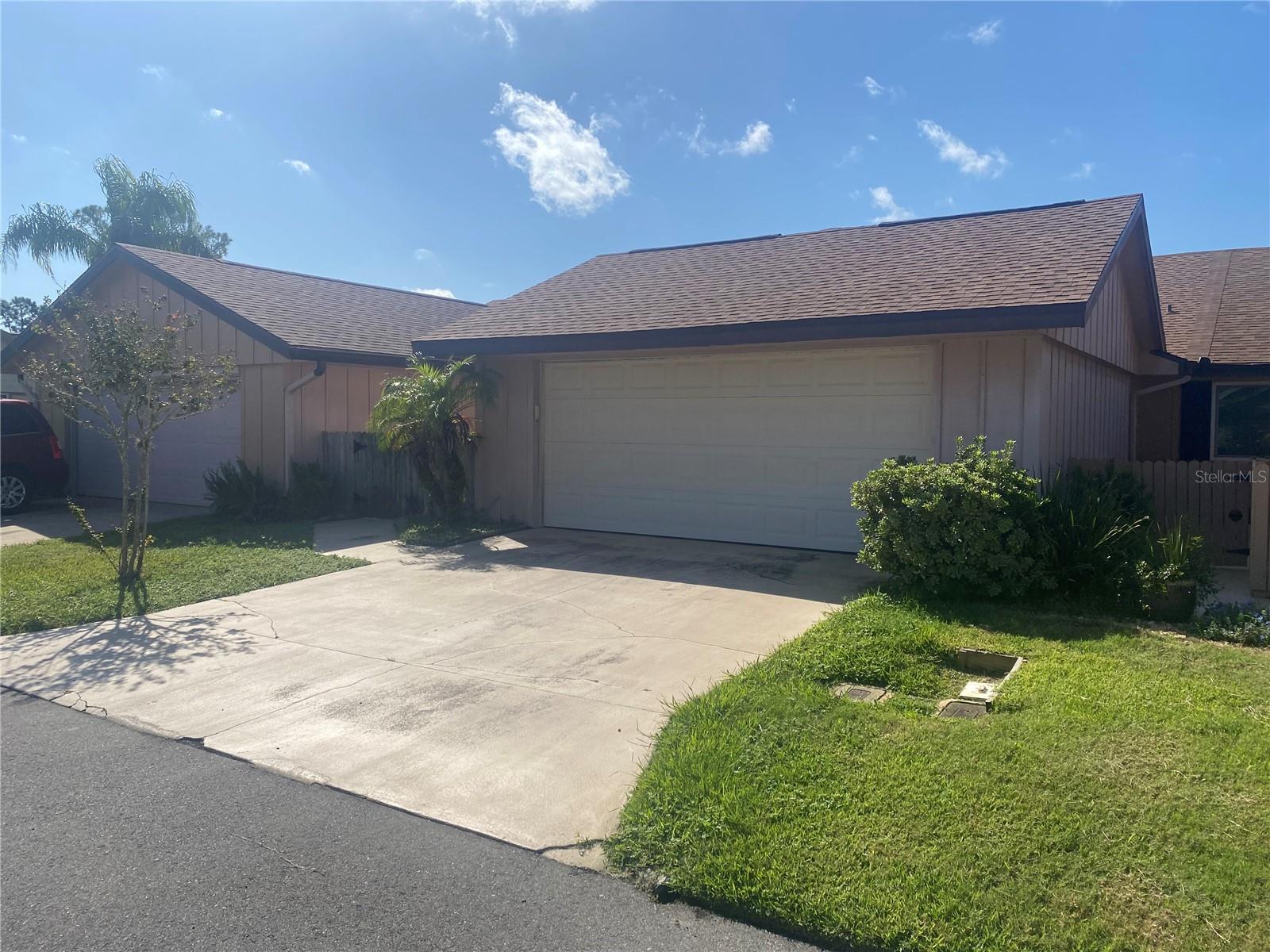 Welcome home to this charming 2 bedroom, 2 bathroom duplex in the desirable Fairgreen community of New Smyrna Beach. Offering 1,252 sq. ft. of living space with a 2-car garage, this property is perfect for those seeking a peaceful lifestyle in a quiet golf course setting.
Inside, youll find:
Bedroom 1 with carpet and Bedroom 2 with wood flooring
Tile flooring throughout common areas for easy care
A spacious living/dining area filled with natural light
A washer included (dryer hookup available) for convenience
A lovely screened Florida room to relax and enjoy the outdoors without the bugs
Located in the Fairgreen golf community, you'll enjoy the serene surroundings while being just minutes from shopping, dining, and New Smyrna's famous beaches.
