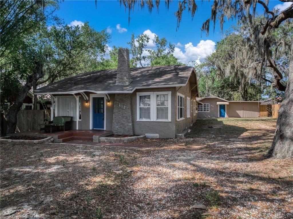 Vacant and turn key ready! Multifamily property in Sebring, Florida with 2 detached homes sitting on an oversized 0.41
acre lot with a recent $320,000 appraisal offering buyers $30,000 in INSTANT EQUITY. Located in a quiet and friendly
neighborhood just minutes away from the newly renovated and popular Downtown Sebring. The 1,711 sqft 3B/2B main
home features a freshly painted white living room, open windows and a cozy electric fireplace. The sunroom room is just
off the living room and can be used as a sitting area, study room or an office. The kitchen features antiques cabinets, with
a small pantry and a small bar overlooking the open dining room. To the back of the home is a large storage room leading
to the laundry area. The home has laminate and original hardwood flooring, a window unit in the back 3rd bedroom for
additional cooling, central a/c, an open front porch, shaded backyard with a built in gazebo and new private fencing. The
738 sqft 1B/1B secondary home is located just behind the main home featuring an open living room with storage closet,
newly installed kitchen countertop and base freshly painted and original open top cabinets, a perfectly sized bedroom with
a master bathroom and an exterior door to the newly fenced private backyard. There is an attached garage to the
secondary home to store all your lawn equipment and belongings. A privacy fence was installed down the middle of the lot
to provide privacy of each home with 2 separate entrances for parking. Each home has individual addresses, mailboxes
and separate meters with Duke Energy and on city water and sewer. The property is currently vacant and was previously
leased with tenants and was also a successful short term rental considering the proximity to Downtown Sebring. This
multifamily is perfect for an investor for future growth, a large family in need for additional space or a first time home
buyer to live in one and rent out the other to reduce monthly bills. Don’t miss out on the available equity in this property
in the growing city of Sebring, Florida!