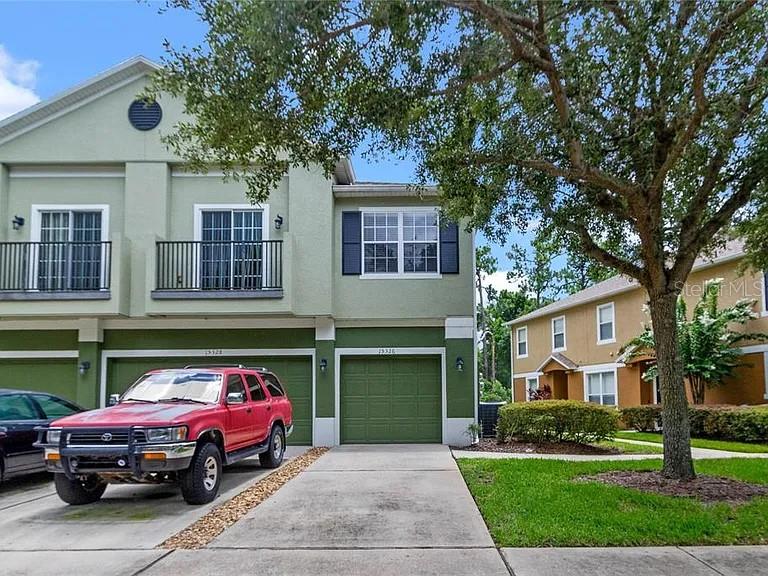 Beautiful townhome in the desirable gated community well-maintained Tucker Oaks neighborhood in the heart of Winter Garden. This property features large double sun-deck balconies and over 9' ceiling heights that give an unbelievable feeling of openness and space with back onto green space in quiet crescent. It has upgrade kitchen Cherry cabinets with stainless appliances. Ceramic tiles in all wet areas. New A/C system and water heater installed in 2024. In a gated community with tree-lined streets, walking paths, pool, basketball courts, BBQ area, tot lot and pet park. Conveniently located close to downtown Winter Garden where you'll enjoy restaurants, shops, festivals, a farmer's market, and the West Orange Bike Trail. With easy access to the Florida Turnpike, Winter Garden Village, and all of Central Florida, this townhome is the perfect place to call home. Make it yours today!