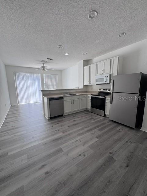 Photo of 5340 Paradise Cay Circle, Kissimmee, FL 34746 (MLS # O6441193)