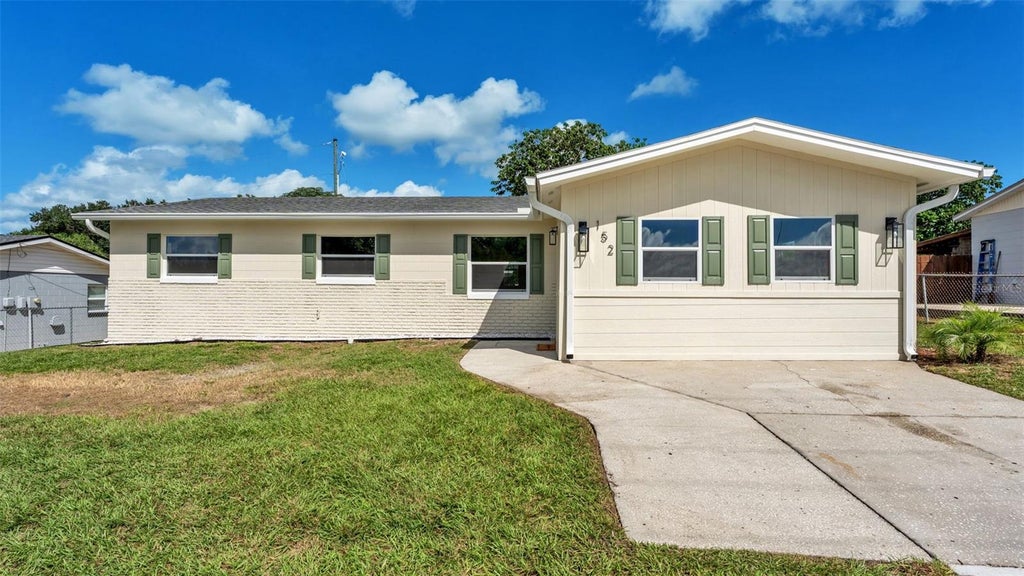 Photo of 152 Hatchineha Road, Haines City, FL 33844 (MLS # P4940174)