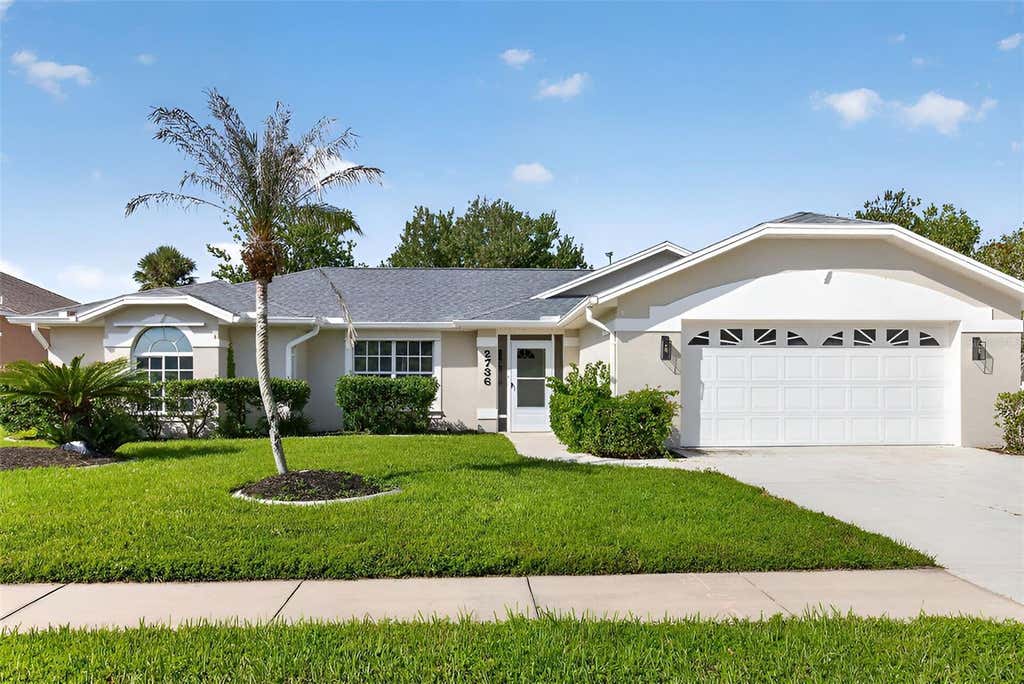 Photo of 2736 Turnbull Estates Drive, New Smyrna Beach, FL 32168 (MLS # V4950351)