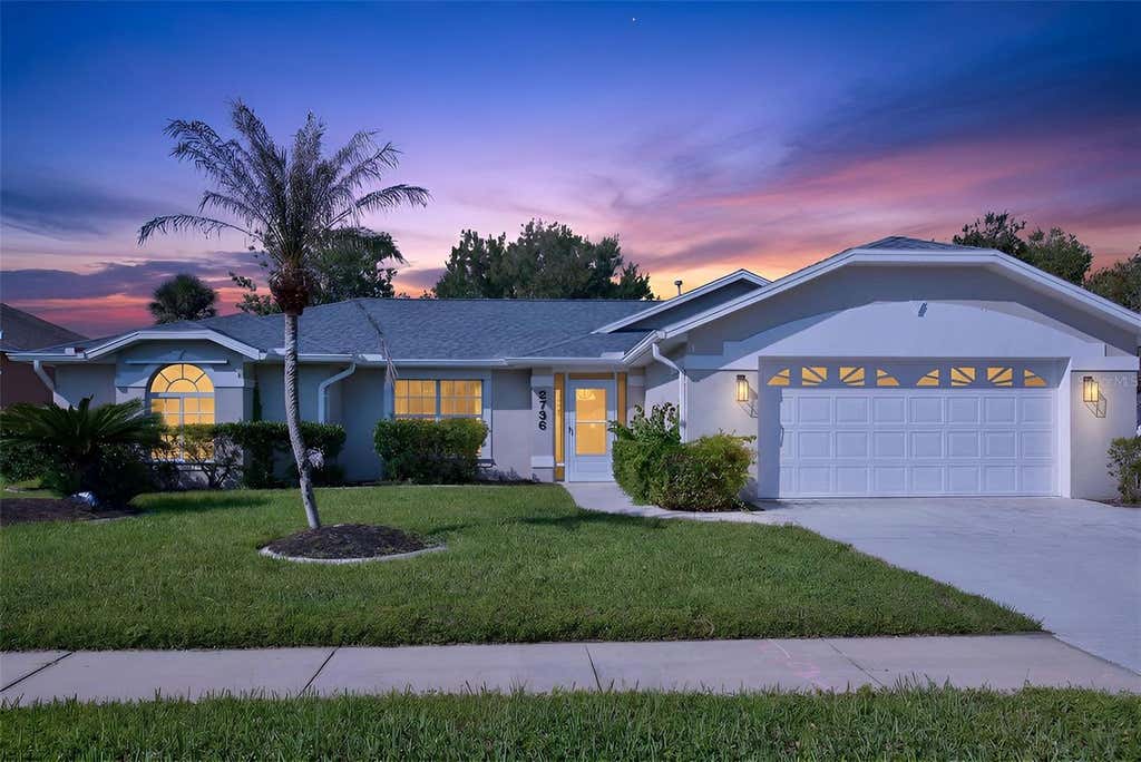 Photo of 2736 Turnbull Estates Drive, New Smyrna Beach, FL 32168 (MLS # V4950351)