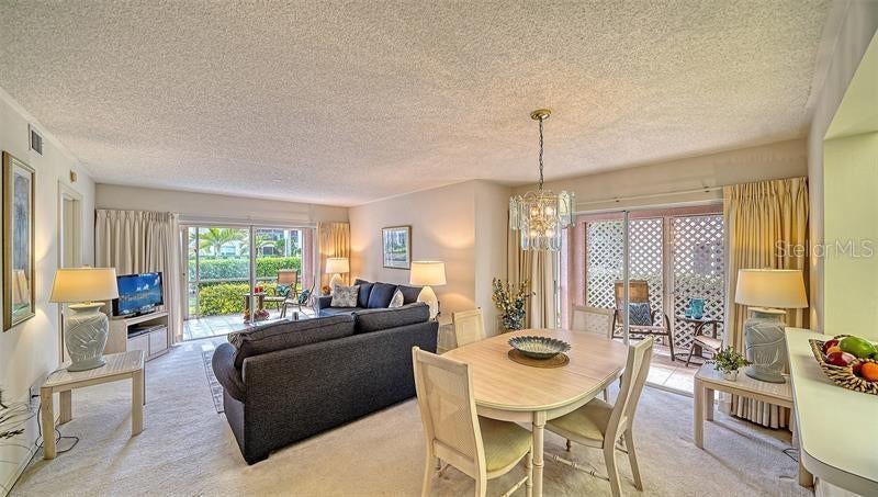Photo of 5655 Sheffield Greene Circle #61, Sarasota, FL 34235 (MLS # A4705709)