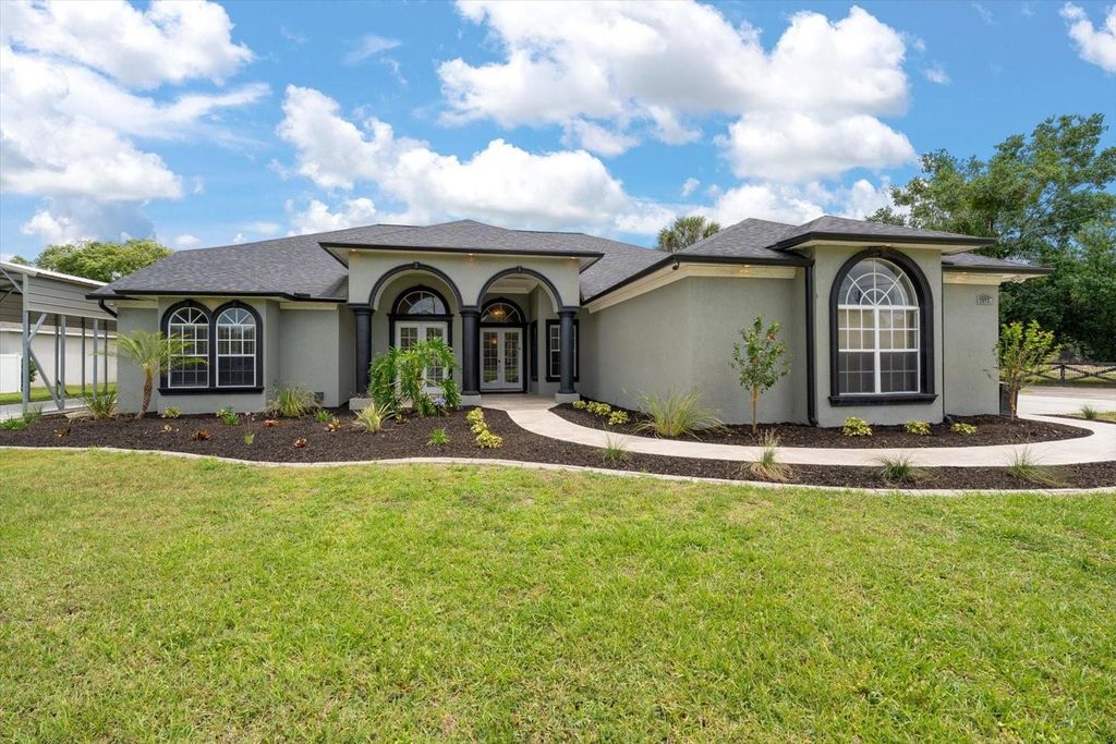 Photo of 18731 Crooked Lane, Lutz, FL 33548 (MLS # TB8503181)