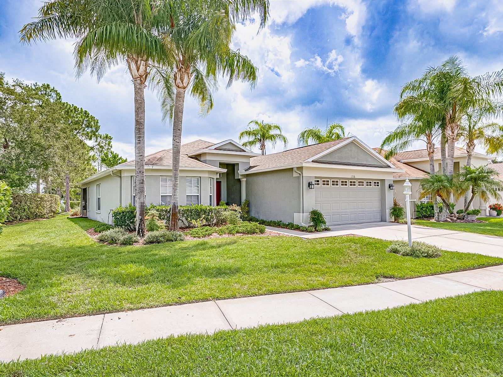 Motivated Seller Price Reduction and NEW Roof before closing! Newer 2023 A/C! This Home in the Highly Desirable 24-Hour Guard Gated, Golf, 55+Community, in Beautiful 'Heritage Springs' is a Must See! NEW, 2024 Updated Full Kitchen! All New Appliances, Including High-Tech LG 'Thin Q' Line that Can Be Managed via WiFi, Slow-Close Drawers, New Sink, New Faucet, New Window Blinds, Wall Paint and Pantry Door! 2023 A/C along with New Ductwork, Air Handler, Condenser and Google Thermostat! Split Bedroom Floor Plan with an En-Suite Primary Bedroom for Privacy. Third Bedroom is currently being used as an In-Home Office, but this IS a 3 Bedroom Home. New Ceiling Fans and Paint Throughout, All Windows Serviced in 2022. the Back Lanai with No Direct Backyard or Side-yard Neighbors as you Look Over the Golf Course Greenery (Outside HOA Improvements in Progress, but temporary). NEWER 2022 Flooring with Soundproofing Padding and Tiles on Lanai. A Car Enthusiasts' Dream is the 2023 Garage Makeover (Vinyl Race Stripes can be removed) with Fresh Paint and Soundproof 'GarageDeck' Coin Pattern Flooring. Well-Kept, Pride of Ownership Home is Move-In Ready! HOA Fee Includes: Cable TV/ Internet, Community Pool, Recreation Facilities, Security! Community Amenities Include: Amazing Country Club Dining Room, Bar, RESORT STYLE HEATED POOL AND SPA! PRIVATE GOLF COURSE Tennis Courts, Bocce, Horseshoes, Shuffleboard, Billiard Room, Card Room, Library, Computer Room & Arts Center! Conveniently Located Near Trinity Hospital, Shopping, Restaurants with Easy Access to Tampa International AIRPORT & World Renowned Clearwater BEACH and Honeymoon Island! GOLF CART Friendly! PET Friendly! NOT In a Flood Zone or Evacuation Zone!