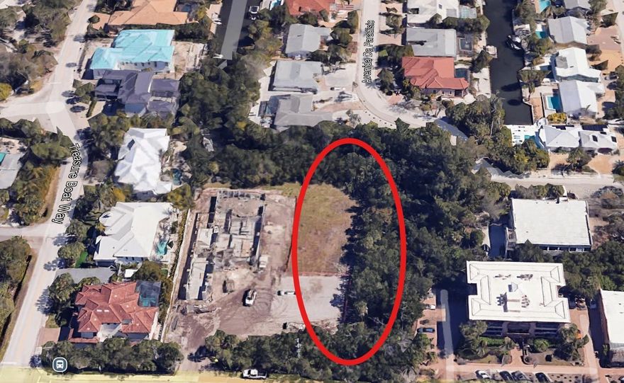 Rare Canal-Front Opportunity on Siesta Key – Last Available Raw Land Parcels.  Don’t miss the final two canal-front parcels on Siesta Key, exclusively offered as a package to one buyer. These gorgeous lots can be kept as individual ¼+ acre parcels or combined into a single ½-acre estate. Build your dream home on the serene, tree-lined canal-front lot and develop the front lot as a revenue-generating rental, guest house, or second home. With separate parcel IDs, the front lot qualifies for a fully independent second home — a rare advantage under current regulations.  Key Features - Two Pre-Reviewed Blueprints: One set of architectural plans for each lot, already submitted for initial review, saving you time and effort.  Prime Location: Just a short walk to Siesta Key’s world-renowned beaches and vibrant Siesta Key Village. Enjoy fine dining, shopping, and entertainment steps away.  Boating Paradise: Approximately 2.2 miles (20-minute boat ride) from your private dock to Sarasota Bay. Seller includes an allowance for boat lift/dock modifications.  Scenic Views: Lush tree-lined canal views along the east and south property lines create a tranquil backdrop.  These lots are priced below market value as a package deal.  Siesta Key Lifestyle: Live the Florida dream with boating access to Sarasota Bay’s fine dining and leisure, a stroll to pristine beaches, or a short walk to Siesta Key Village’s restaurants and shops. Conveniently located near Sarasota Bradenton International Airport, St. Armands Circle, Sarasota Memorial Hospital, theaters, and more.  Don’t miss this rare opportunity to craft your perfect coastal retreat in one of Sarasota’s most coveted locations. Welcome to paradise on Siesta Key!