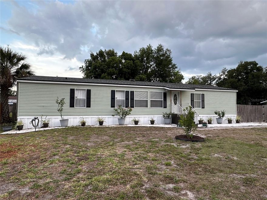 Discover and enjoy this GREAT VALUE at 1434 Lakeshore Drive, Casselberry! This spacious 4-Bedroom, 2-Bath Pool Home sits on quarter-acre lot with NO HOA, giving you the freedom to bring all your toys: Boats, Jet Skis, Trailers, RVs, and more! Property also has Walk-In Storage Shed/Shop, extra Concrete Parking Areas, Wood Fenced Yard with Access Gates, Fire Pit Area and New Air Conditioning System. Enjoy Florida living with your own Above-ground Pool and Screened Patio; perfect for relaxing and entertaining. Inside, you'll find large Wood Kitchen with Stainless Steel Appliances & Sink, comfortable living spaces with Cathedral Ceilings & Luxury Vinyl and laminate Floors with plenty of room for family and guests. Located in a highly desired school district and close to dining, shopping and major roadways, this home offers the perfect combination of space, convenience, and flexibility. Don't miss this unusual opportunity to have it all at a GREAT PRICE.