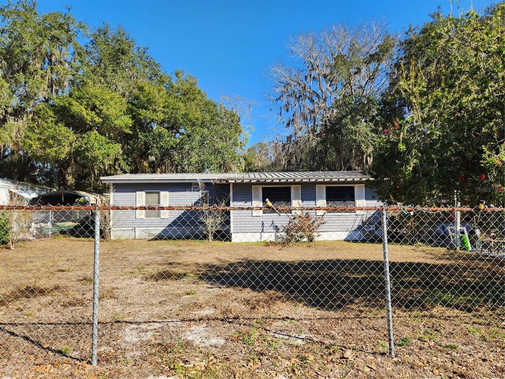 Photo of 2289 Cr 436a, Lake Panasoffkee, FL 33538 (MLS # OM717399)